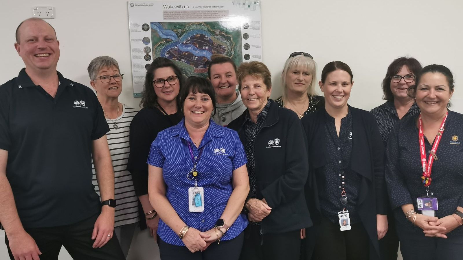 The group of shift workers from Armadale Hospital who uncovered the underpayment stand together smiling.