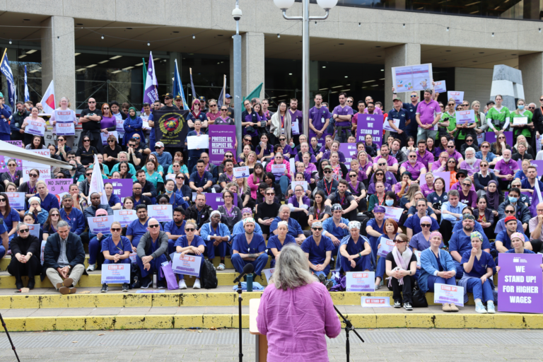 HSUWA Secretary Naomi McCrae addresses a crowd of public sector health workers at the public sector pay rally.