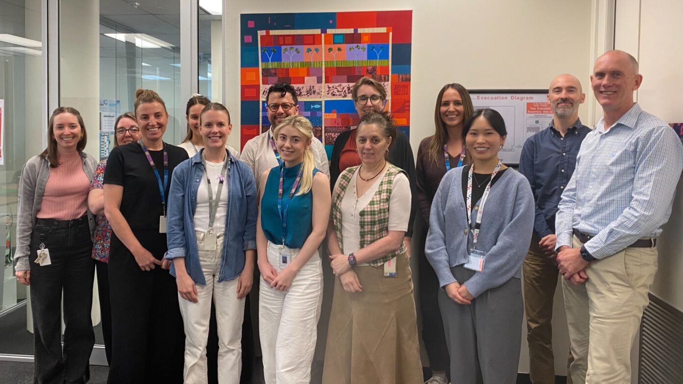 A group of health workers standing together in a group