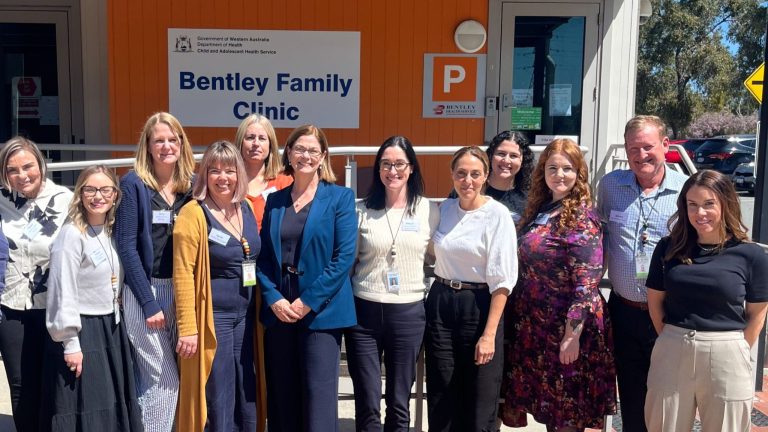 Members from Bentley CAMHS stand outside the clinic with the Minister for Health and Mental Health.